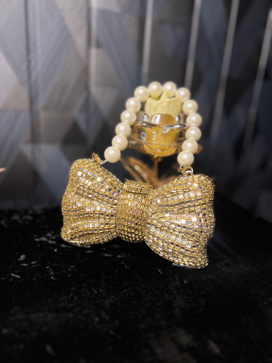 Kundan Bow Clutch with Pearl Handle